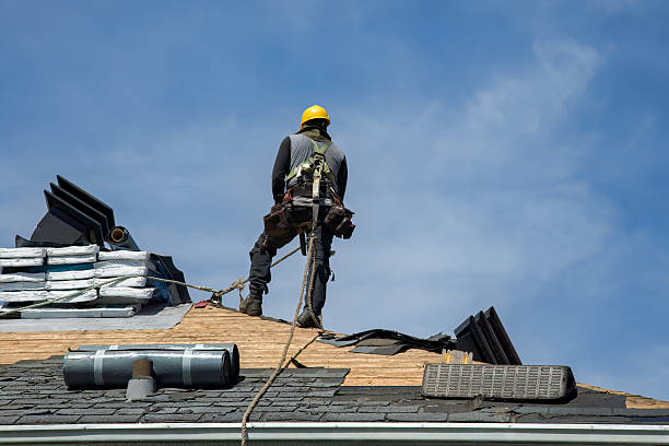 Professional Roofing technician working in Bellport, NY